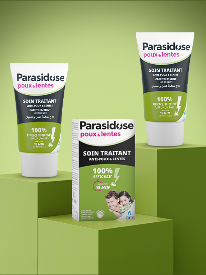 Parasidose Anti-Lice & Nits Treatment – 100% Effective in 15 Minutes Alt: A collection of Parasidose anti-lice and nits treatment products, including cream and lotion, displayed on a green background for an effective hair care solution.